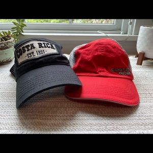 Two Costa Rica hats. Black and red.